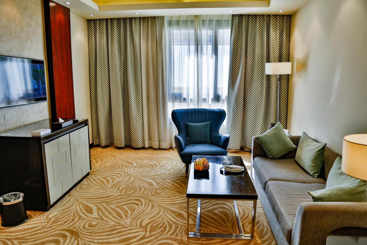 Triumph Luxury Hotel El El Cairo Exterior foto Living room of a suite
