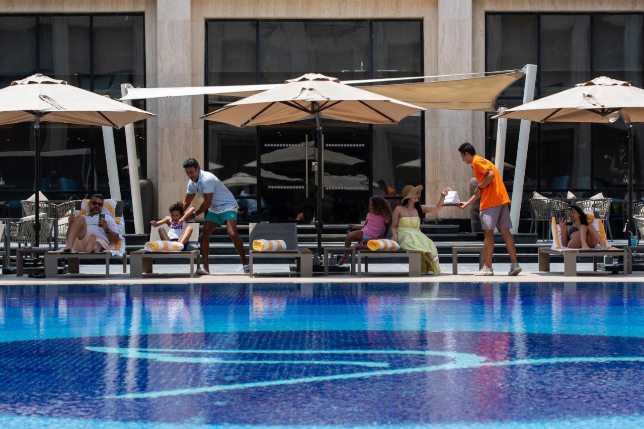 Triumph Luxury Hotel El El Cairo Exterior foto The pool at the Ritz-Carlton, Dubai